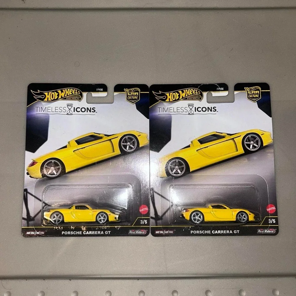Hot Wheels Premium Porsche Carrera GT Yellow 2 Car Diecast Bundle